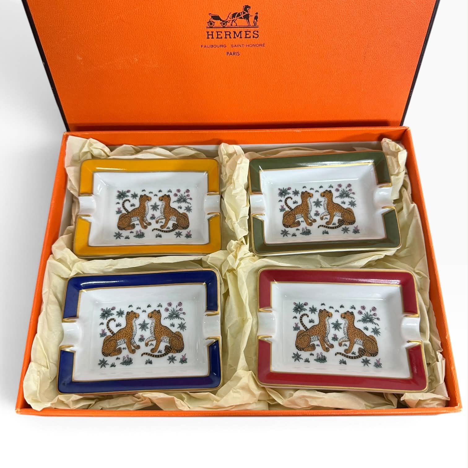 Hermès porcelain cheetah ashtray set in its orange box